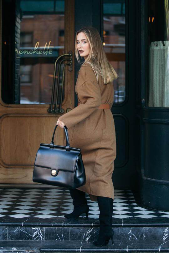 a woman holding a bag